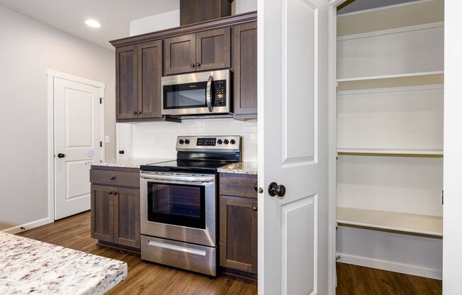 End-Unit Townhome - Modern Finishes, Air Conditioning, Garage!