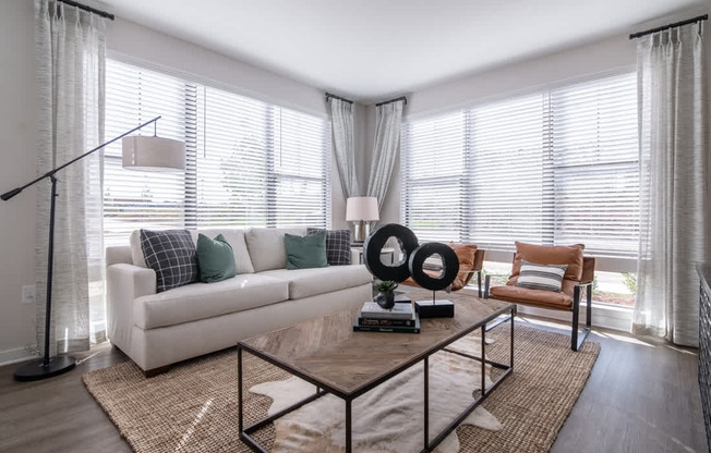 a living room with a couch and a coffee table