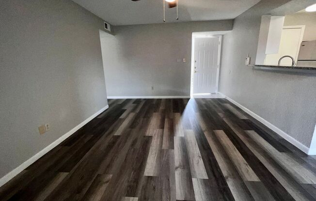 3/2 Regency Gardens 1st Floor Condo with New Plank Fooring, Stainless Appliances, and Fresh Paint!
