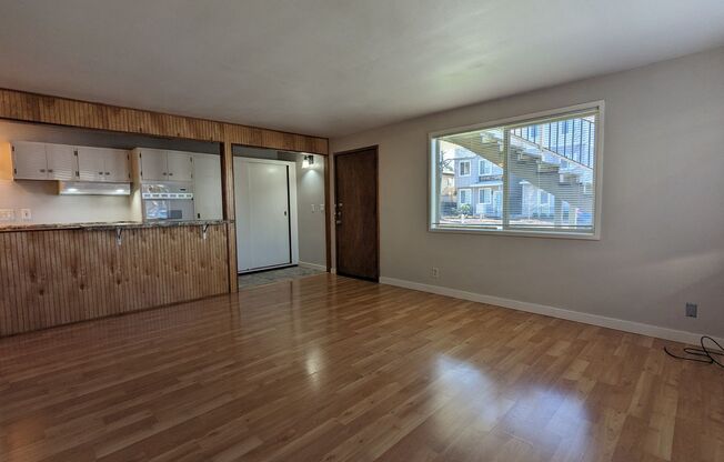 Spacious 2-Bedroom, 1-Bath Apartment With Solid Surface Floors!
