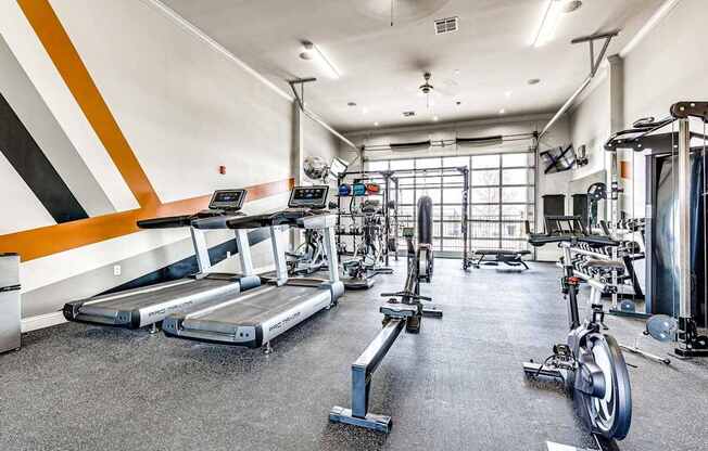 the gym at the flats at big tex apartments