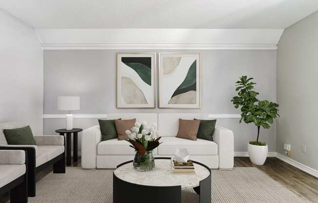 a living room with a white couch and a coffee table