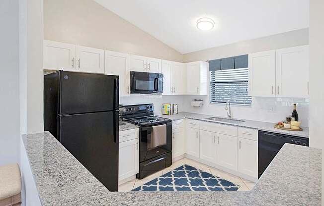 Kitchen with White Cabinets