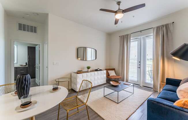 modern-styled living room at Residences at 3000 Bardin Road, Grand Prairie, TX, Texas