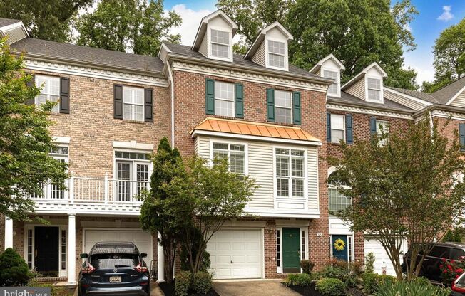 Live in luxury in this stunning 4bd, 3/5bth 4 level townhome in the sought after waterfront community of Woods Landing.