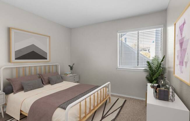 an empty bedroom with a bed and a window