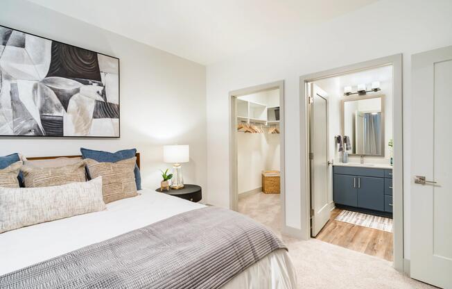 A comfortable primary bedroom with a connected primary bath and a spacious closet, offering a thoughtful layout for daily routines and unwinding.
