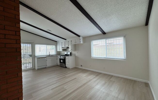 Adorable house in awesome Carson location w/beamed ceilings, fireplace, large yard, central A/C & 2-car garage
