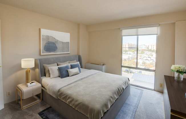 Staged bedroom with spacious closet space and Wharf view