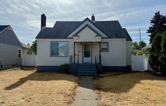 Ideally Located 2 Bed 1 Bath Spokane Home w/ Large Fenced Yard & Detached Garage!