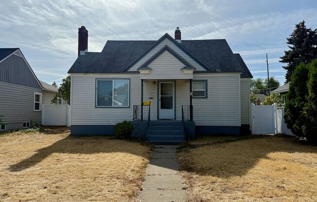 Ideally Located 2 Bed 1 Bath Spokane Home w/ Large Fenced Yard & Detached Garage!