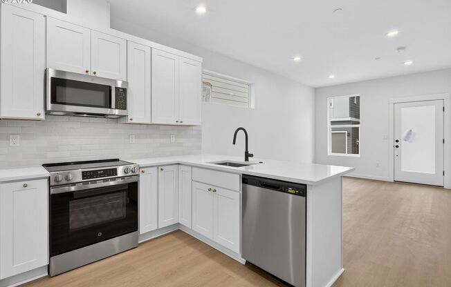 Brand-New 2-Bedroom Home with White Granite Kitchen, Open-Concept Living & Attached Garage