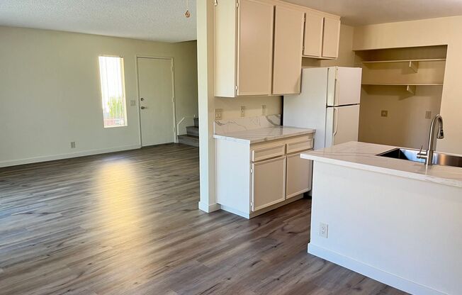 Large two-story townhouse with 3 bedrooms and 2 full baths and a private patio
