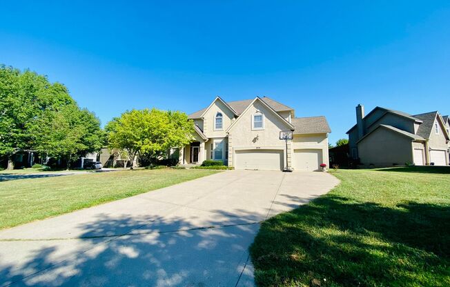 {8514}  Village of Kensington + Finished Basement + 3 Car Garage + Community Pool + Blue Valley Schools!