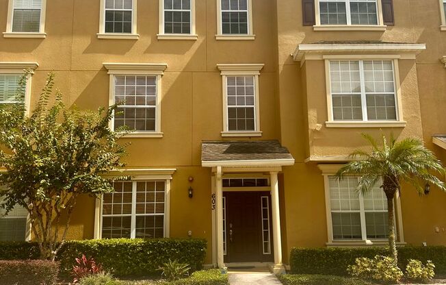 Beautiful 3 bedroom 2 full/2 half bath townhouse with high ceilings and a 2 car garage