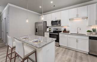 Kitchen with island at The Reserve at Mayfaire Apartments, Wilmington NC