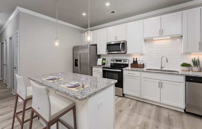 Kitchen with island at The Reserve at Mayfaire Apartments, Wilmington NC