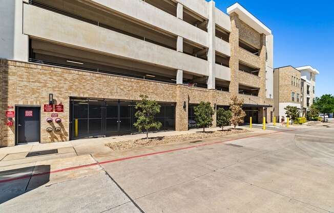 A parking garage with a clear blue sky in the background.