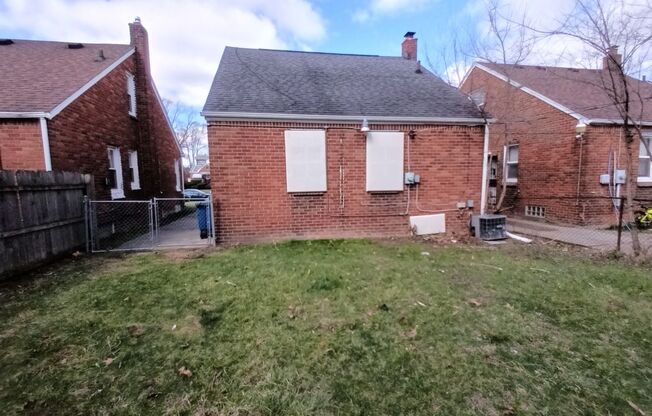 4 bed/1 bath brick home now available!