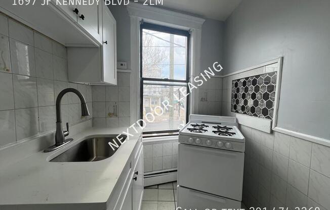 1697 JF KENNEDY BLVD