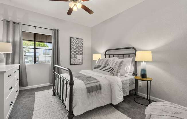 a bedroom with a bed and a ceiling fan at Vaseo Apartments, Arizona, 85022