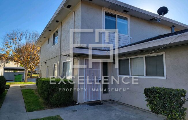 2/1 Townhouse - Updated Kitchen, Community Pool, Storage, One Side of 2 Car Garage (For Storage)