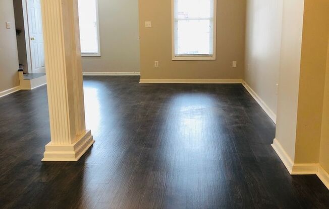 Close to Downtown Greer - this is a Fantastic 2 Bedroom, 2.5 Bathroom end unit condo that offers tons of storage and open space.