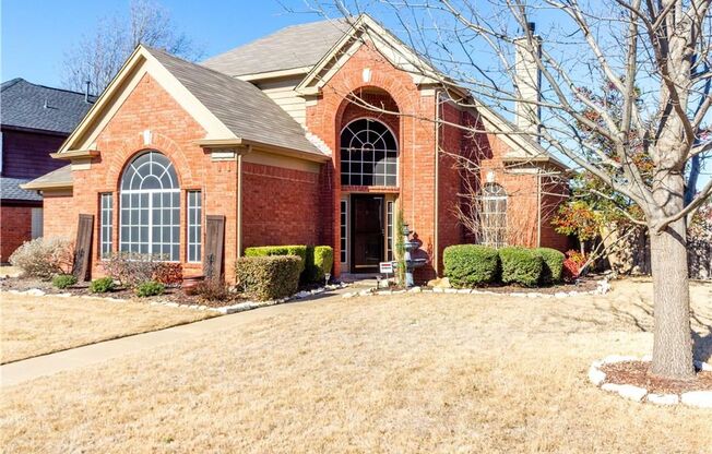 Beautiful 2 Story Home On A Large Corner Lot With Gorgeous Landscaping And Huge Covered Porch Plus Grass Area!