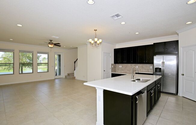 Modern 3/2.5 Spacious Townhome with Gorgeous Lake Views and 1 Car Garage in Thornbrooke - Sanford!