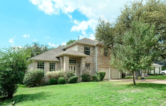 Nice executive 4/3.5/2 home on large corner tree shaded lot!