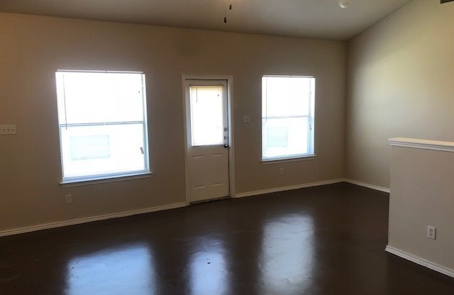 2 Weeks Free! Spacious 3BR Townhome with High Ceilings, Private Garage & Open Floor Plan