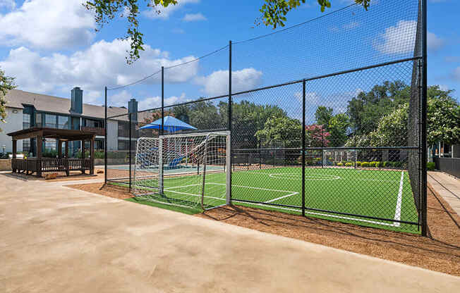 Community Soccer Field with Nets at Bridges at Deer Run Apartments in Dallas, TX.