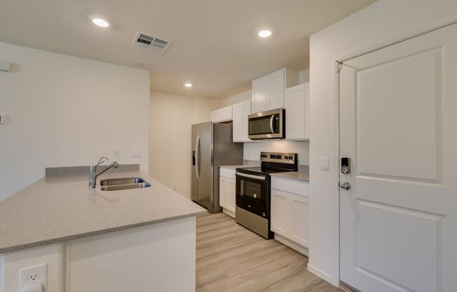 Gorgeous Townhome with upgrades in gated community* 3 large bedrooms, 2 car garage*Community pool, park, tennis courts pluse more*