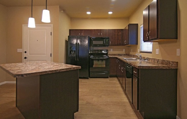 kitchen, kitchen island at Cascades of Mandan, Mandan, 58554