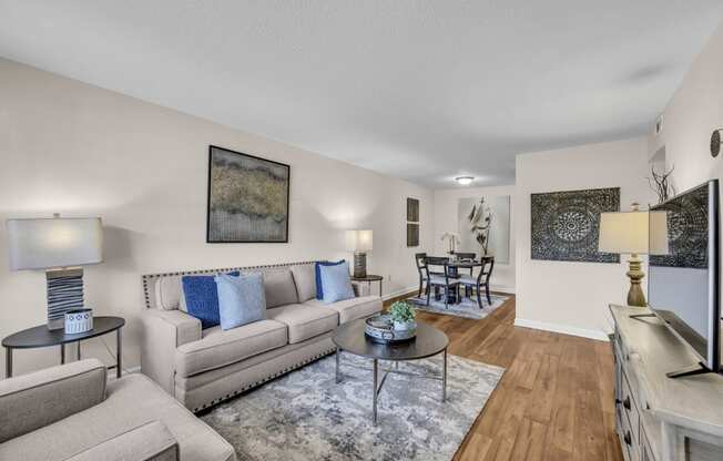 a living room with couches and a table