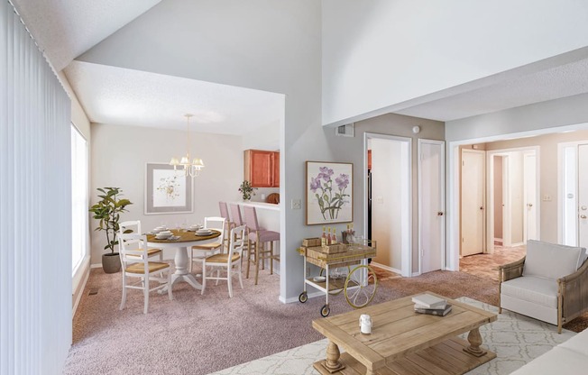 a living room and dining room with a table and chairs