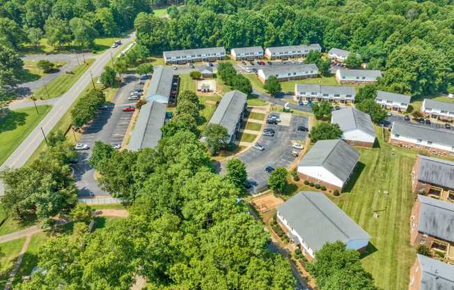 an aerial view of a neighborhood of buildings and trees