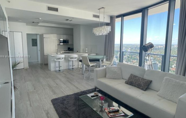 Remarks:	Enjoy stunning Skyline and Bay views from the wraparound balcony of this furnished 2-bedroom, 2-bathroom corner unit for rent at Brickell Heights.