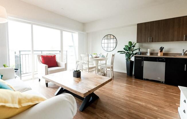 Kent Apartments - The Platform Apartments - Living Room, Dining Room, Kitchen, and Deck