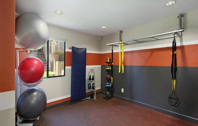 Fitness Room with resistance bands, kettle, inflatable fitness, and medicine balls