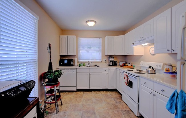 Image of kitchen with  cabinets and appliances