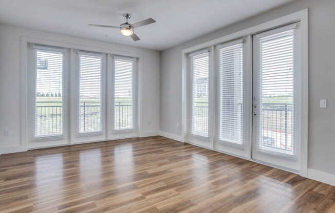 Living Room with Balcony and Hard Surface Flooring