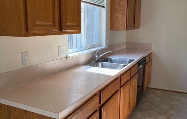 Four Bedroom w/ fenced yard, large garage