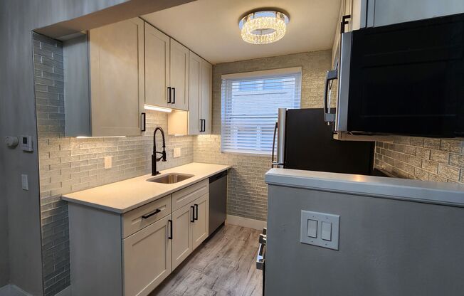 **One Bedroom Located in Clayton***Brand New Rehabbed Apartment***In Unit Washer/Dryer + Covered Parking***