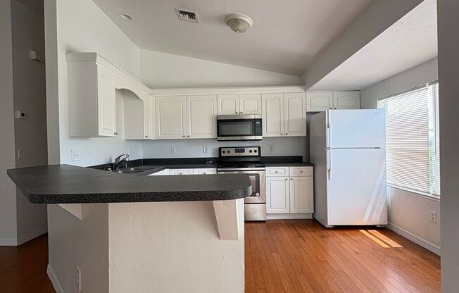 Freshly painted 3 bed 2 bath home w/fenced yard and well service Available NOW!