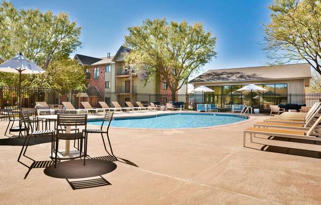 Outdoor Pool and Sundeck with Chairs