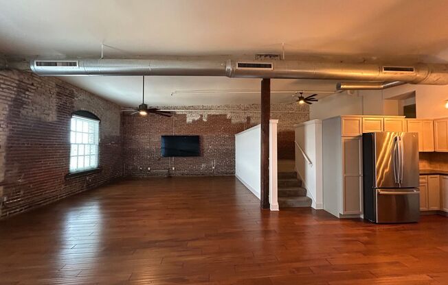Pent House in the Lofts! Gorgeous Pool! Downtown Living at Its Finest!