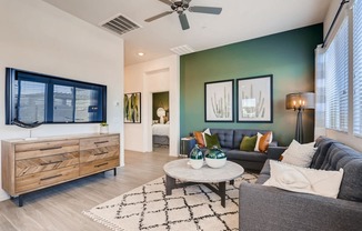 Living Room With Television at Avilla Centerra Crossings, Goodyear, AZ, 85338