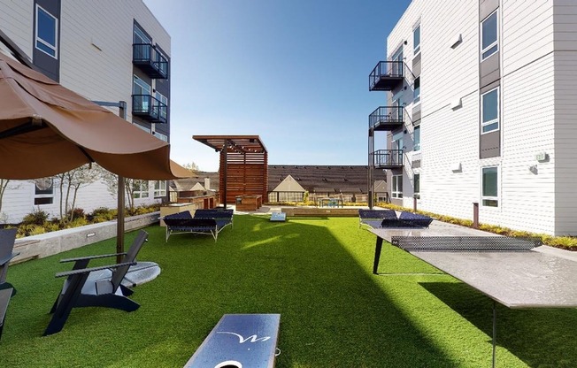 Relax in the landscaped courtyard or play a game of cornhole