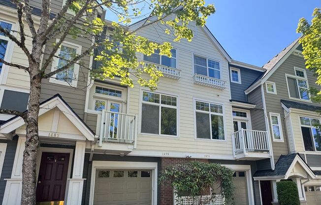 Spacious is Aqua Highlands one bedroom plus den townhome with garage